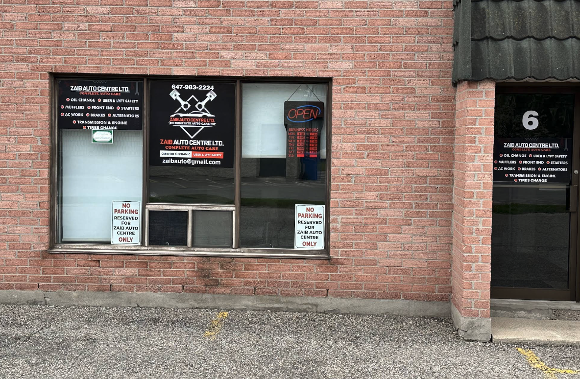 Zaib Auto Centre storefront on Bronte Street South, Unit 6, with service signage in the window